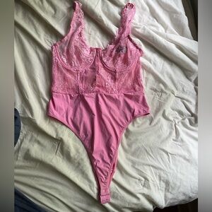 Pink lace lingerie bodysuit